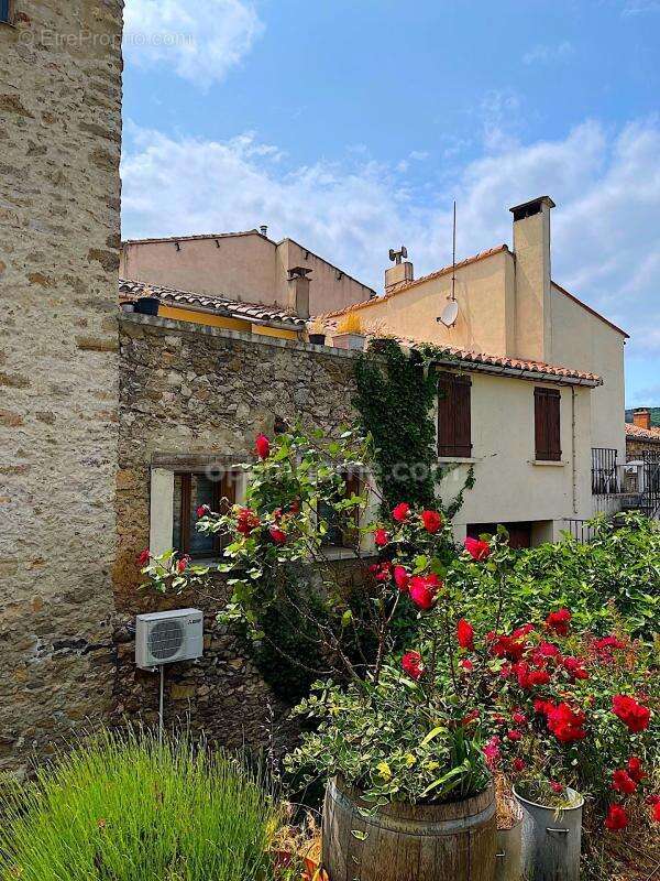 Maison de village avec terrasse de toit - photo 10