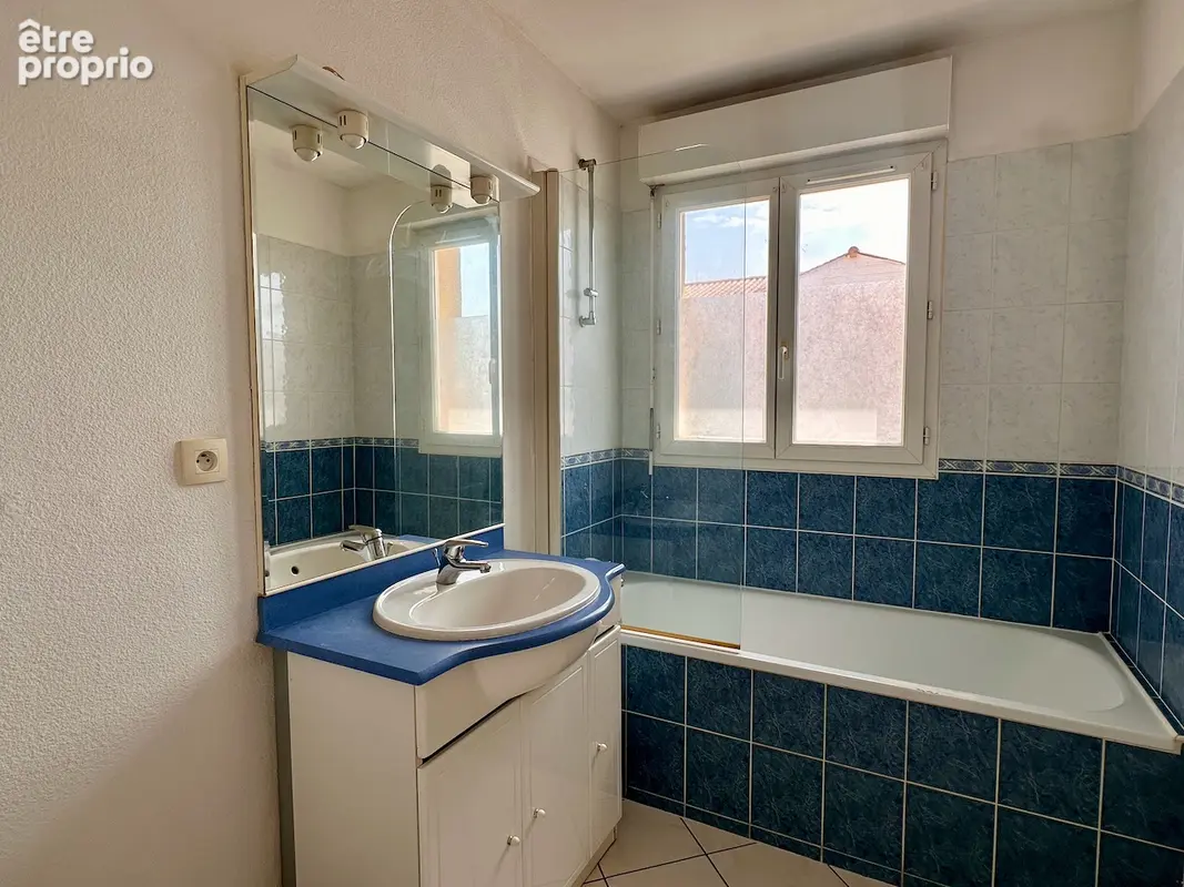 Appartement T2 de 47 m² avec balcon et stationnement Centre-ville - photo 8