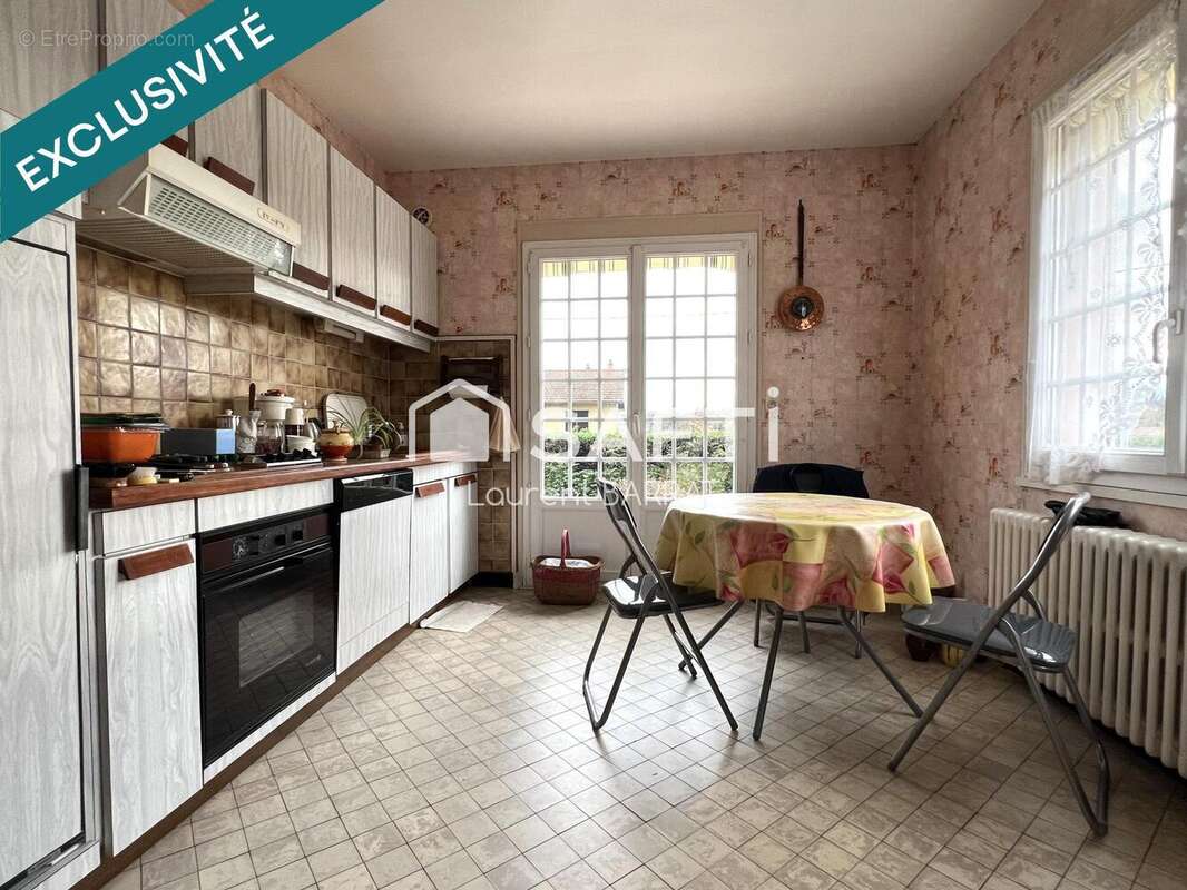 Photo 4 - Maison à LE BREUIL-SUR-COUZE