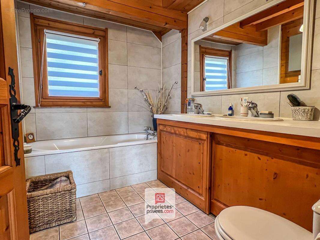 Plateau des Petites Roches (38660) - Chalet T6 en madriers + studio + carport + jardin - photo 11