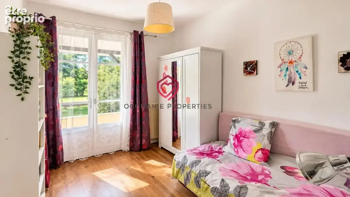 Maison de plain pied implantée sur un terrain arboré de 2 000 m² - photo 8