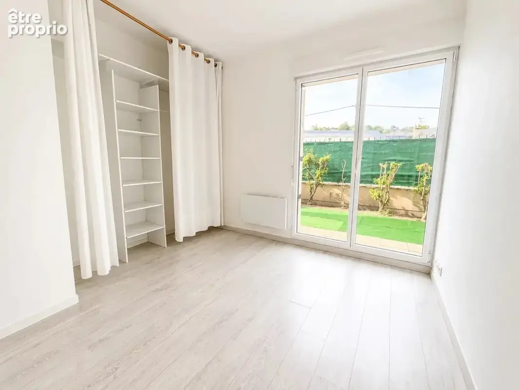 Appartement F3 de 62 m² avec jardin privatif et place de parking sécurisée - photo 6