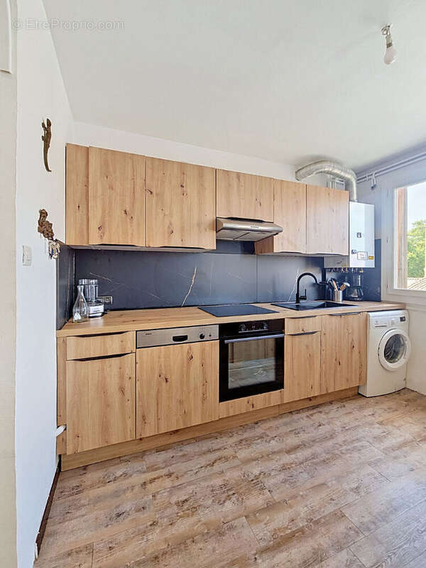 Appartement Nimes 3 pièce(s) 64.58 m2 - photo 4