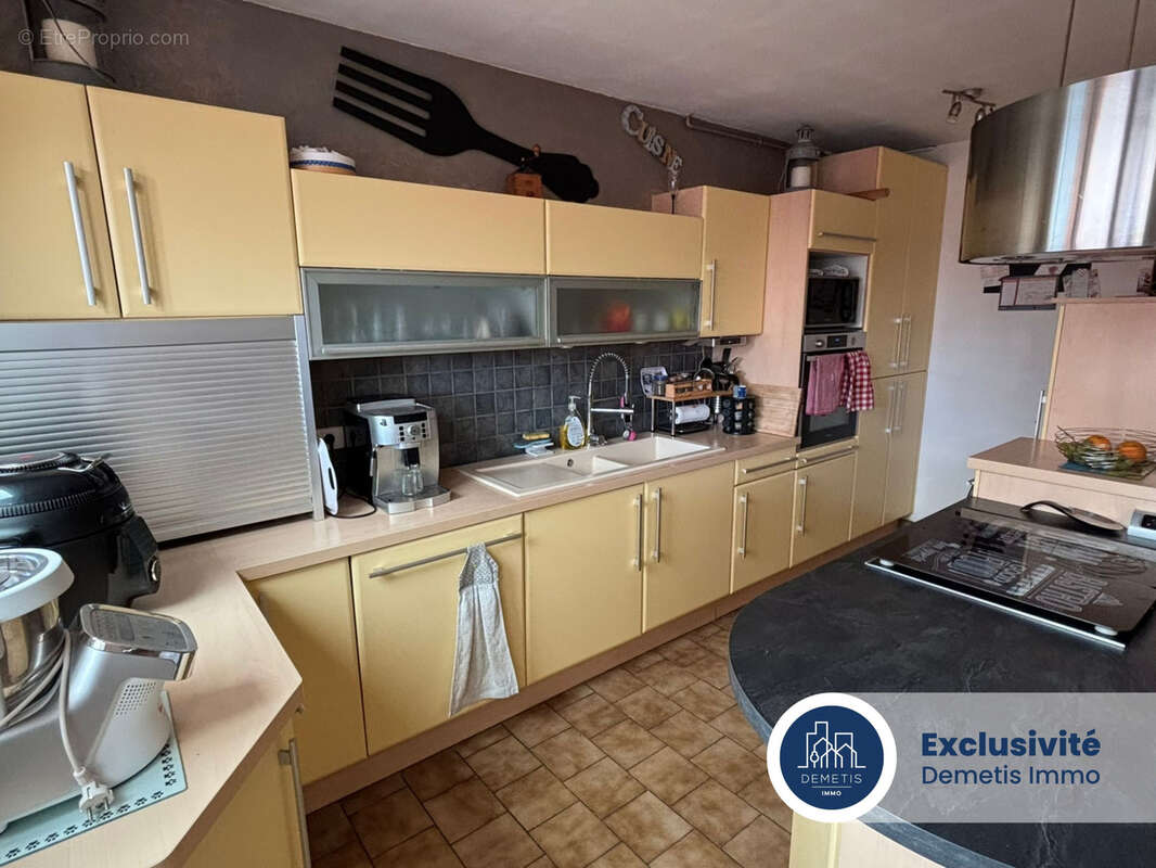 Maison familiale avec 4 chambres, jardin et garage - photo 5