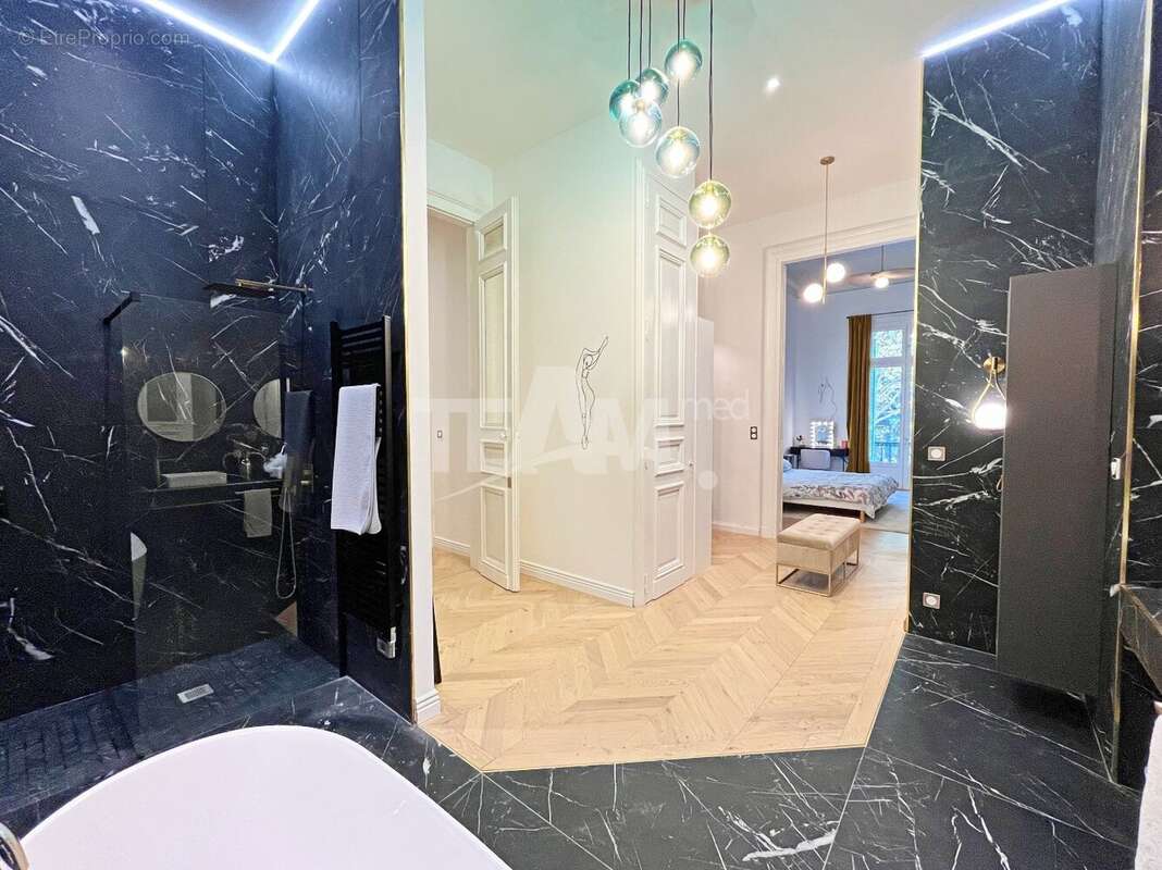 Appartement Haussmannien rénové d'exception - photo 11