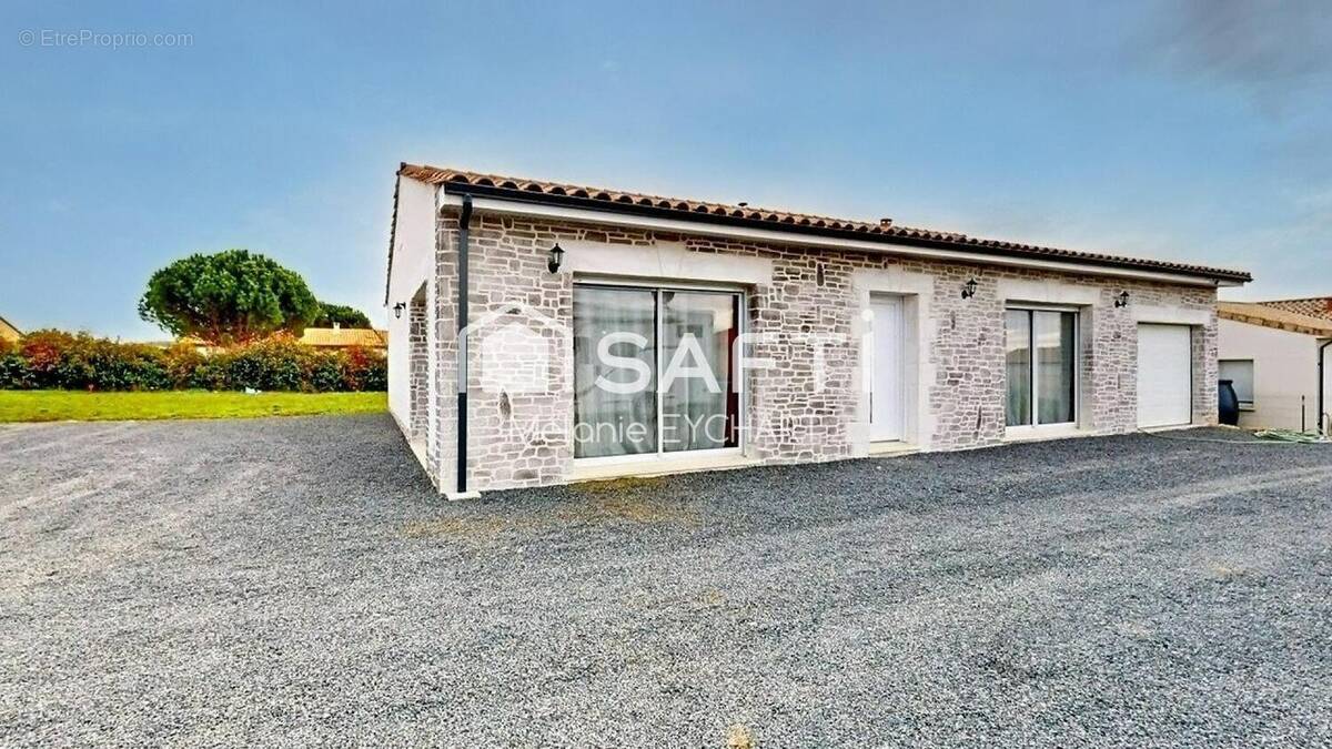 Photo 1 - Maison à TAPONNAT-FLEURIGNAC