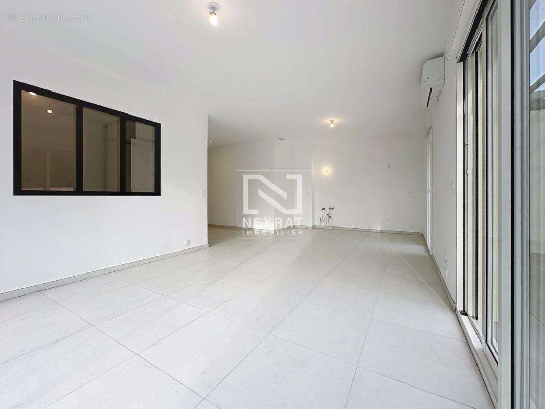 Quartier jean moulin - t4 dernier etage avec double parking - photo 3