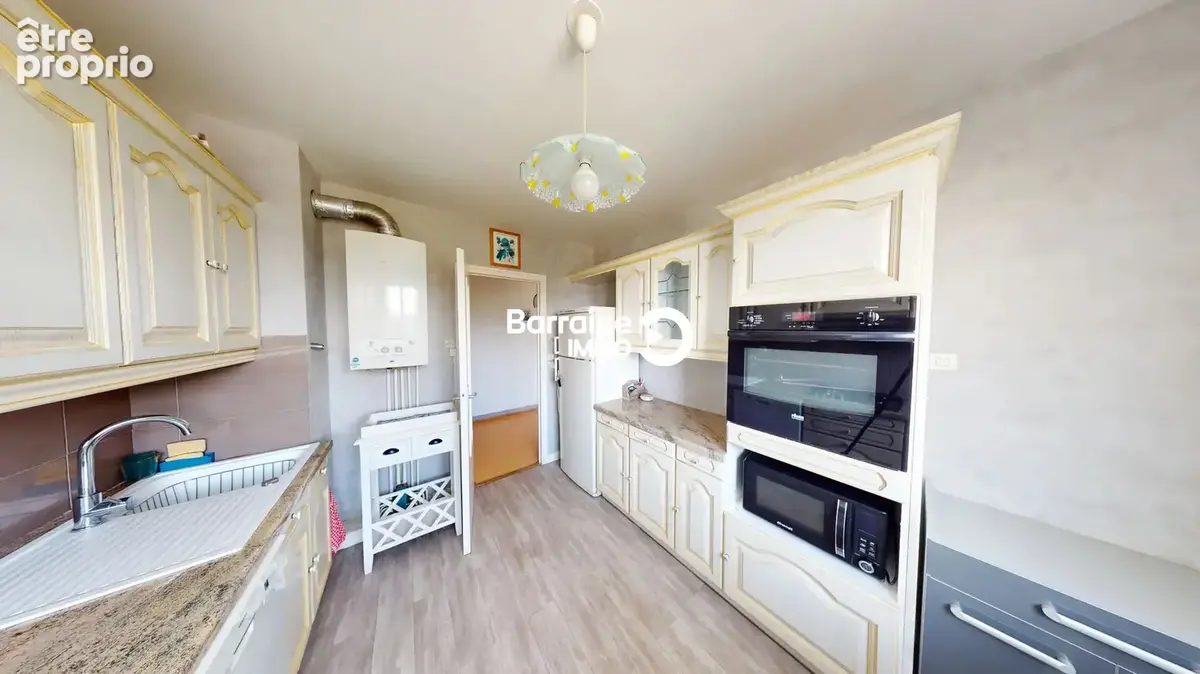 A vendre- lorient secteur merville- appartement t5 de 90 m² avec balcon -garage-ascenseur - photo 5