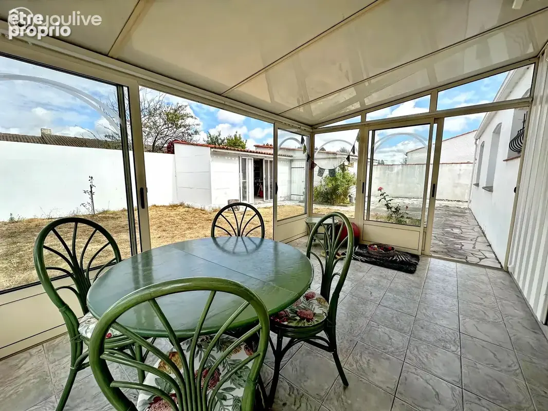 Maison plain-pied 103 m² – 3 chambres – jardin – véranda – grand garage - photo 3