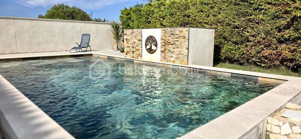 Maison à SAINT-LAURENT-DES-ARBRES