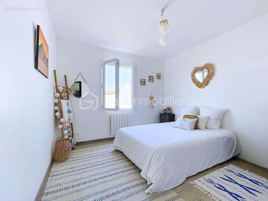Maison plain-pied - 3 chambres - jardin privatif - photo 5
