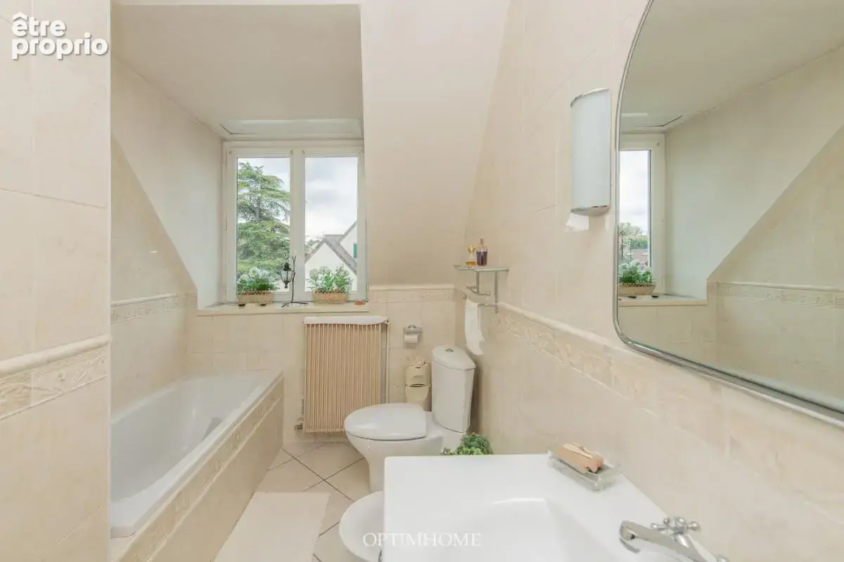 EXCLUSIVITÉ - Maison familiale avec jardin arboré + double garage - photo 29