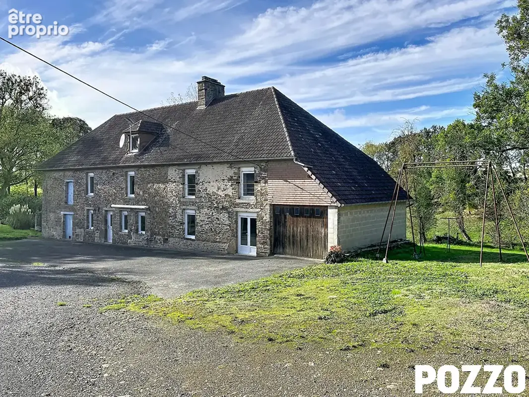 A vendre. guilberville. maison  en pierres de 200 m² avec plus de 3 ha et dependances. - photo 2