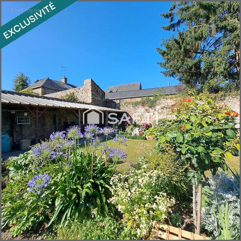 Photo 2 - Maison à JUVIGNE