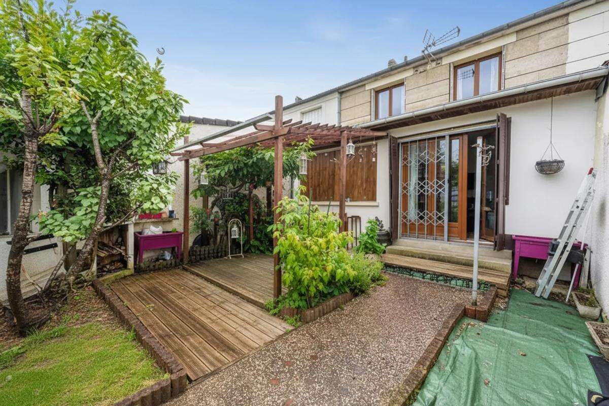 Maison de 5 pièces de 80 m² à Sainte-Geneviève-des-Bois - photo 15