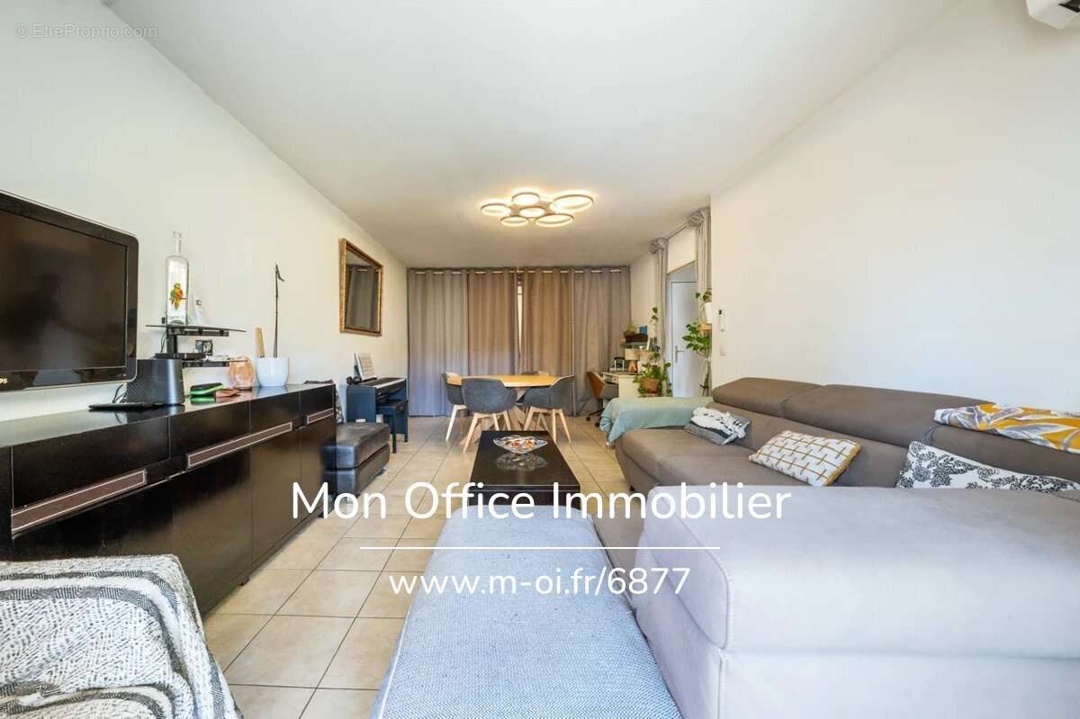 Référence : 6877-PAN. - Appartement 3 pièces de 68 m2 avec terrasse + box - photo 2