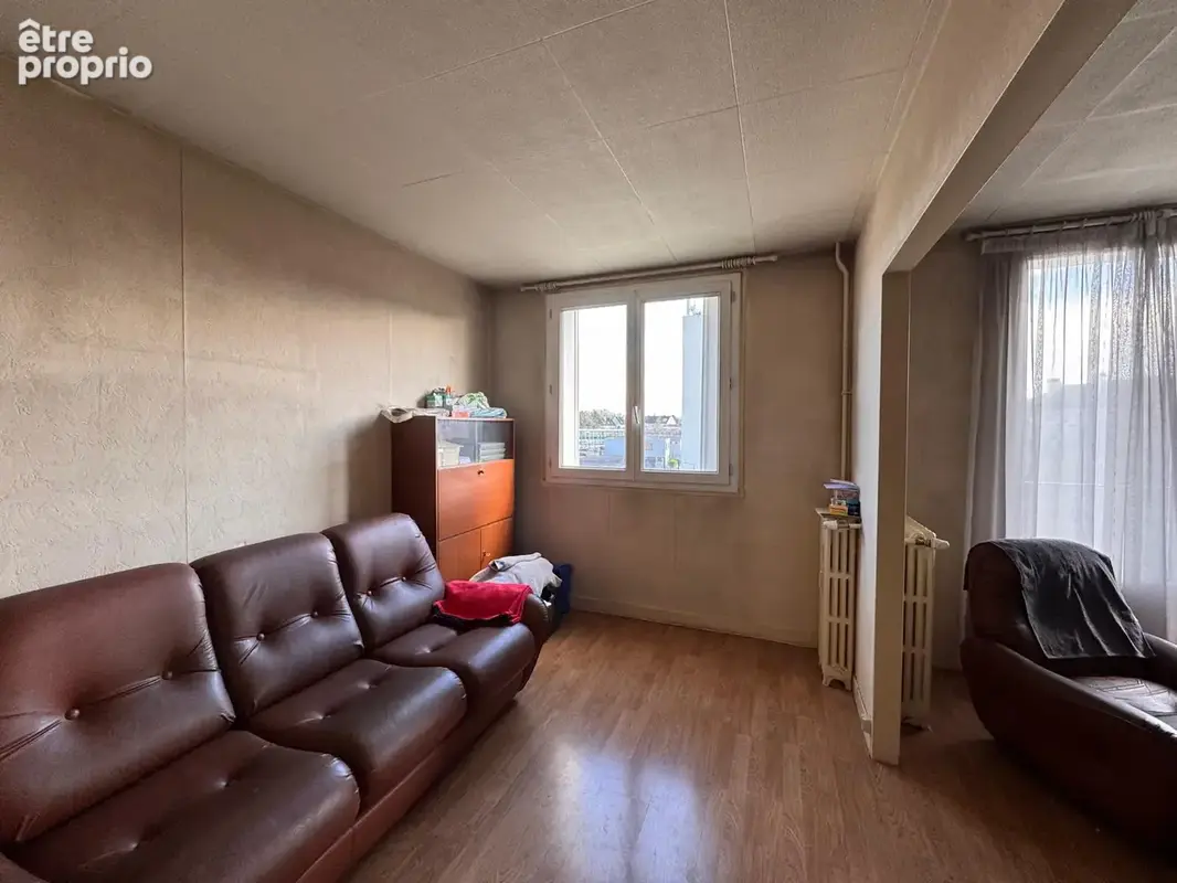 Appartement 4 pièces à Brétigny-sur-Orge   Résidence arborée, balcons et fort potentiel - photo 5