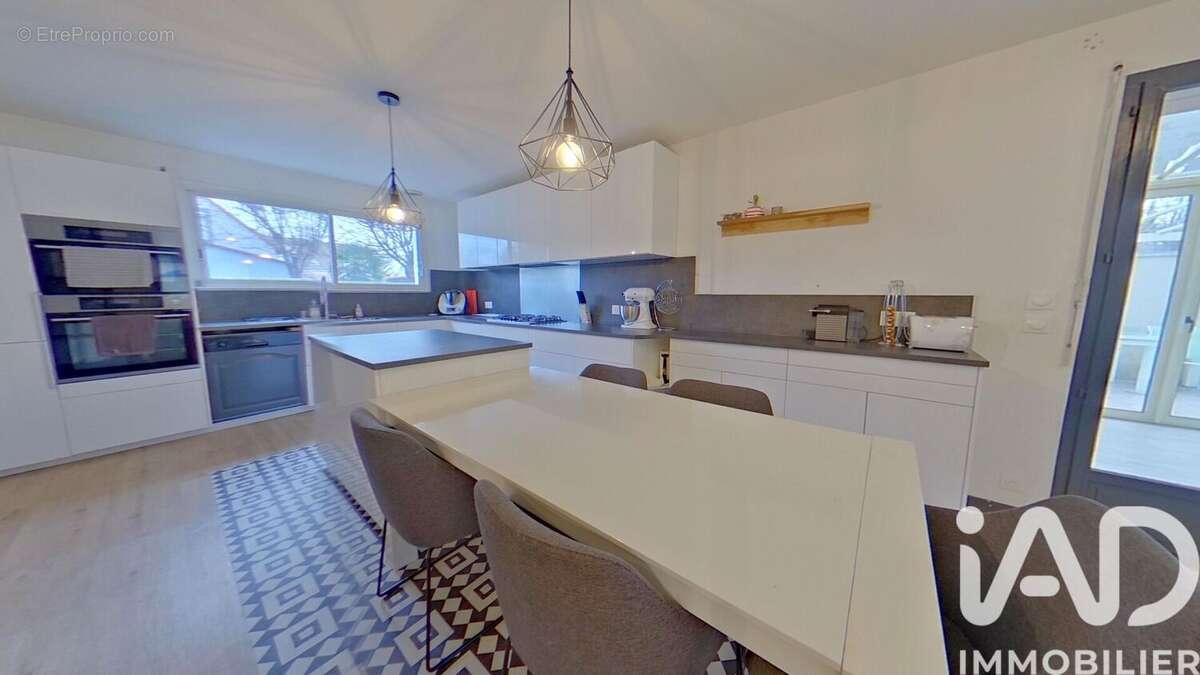 Photo 2 - Maison à LIEUSAINT