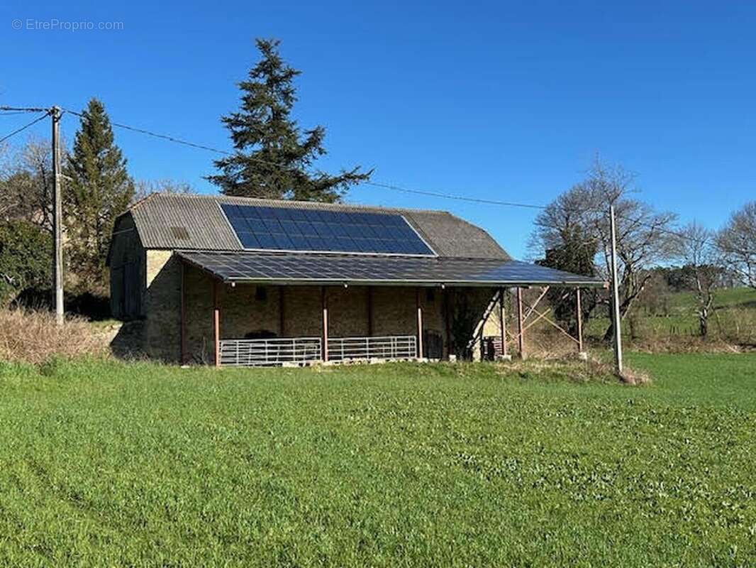 côté - Maison à LATRONQUIERE