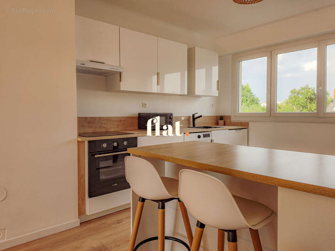 Appartement T3 de 70 m2  - RD POINT DE VANNES - 2 chambres + Cave - photo 33