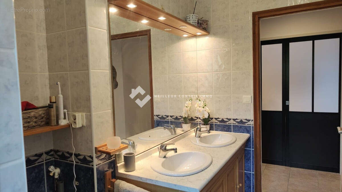 Maison 5 pièces 140 m² à vendre à Saint-Georges-Les-Baillargeaux (86130) - photo 5