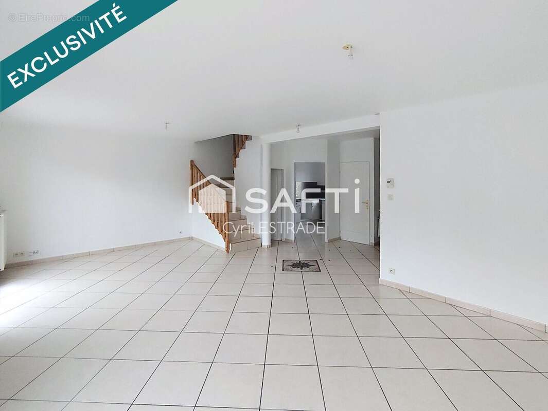 Photo 2 - Maison à SAINT-PAUL-EN-JAREZ