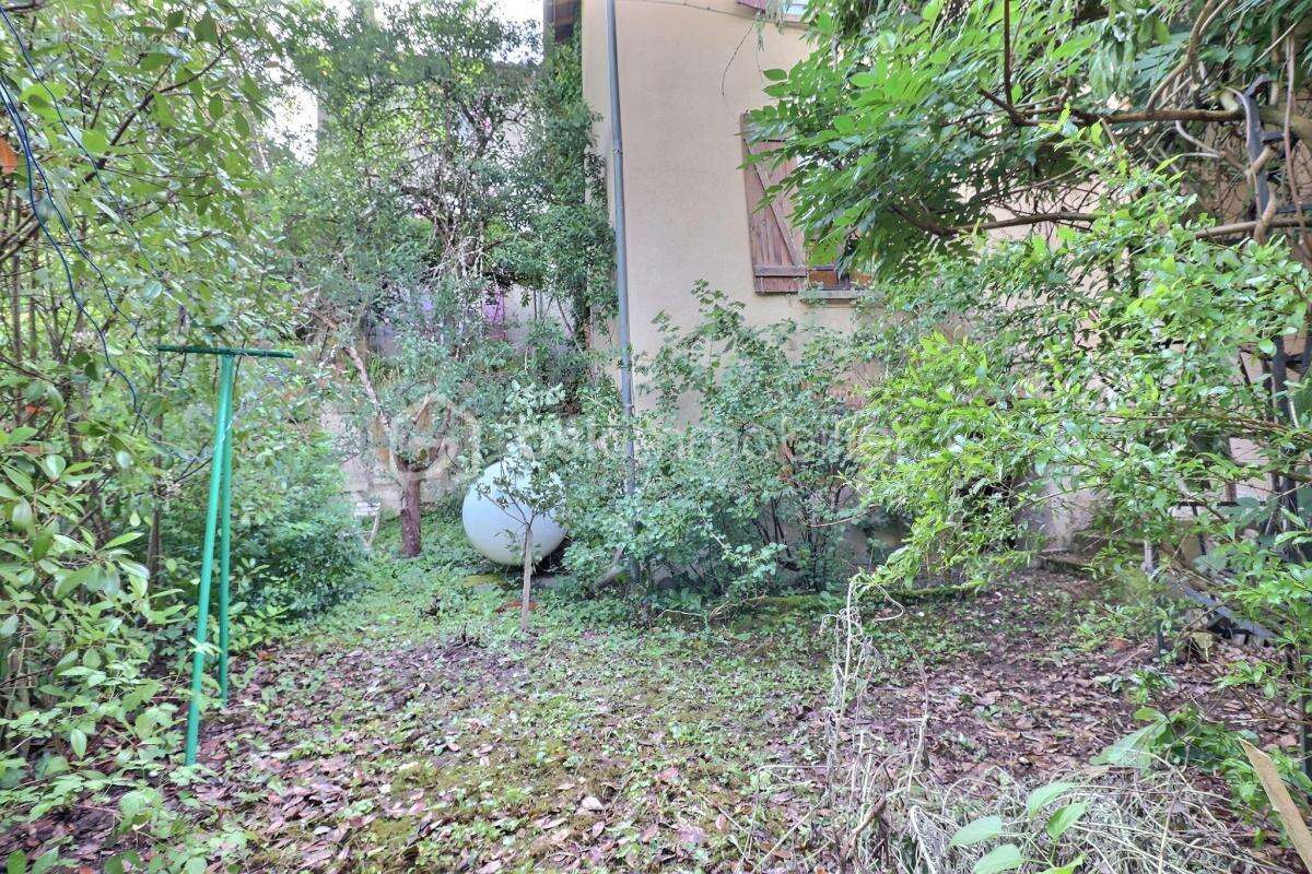 Maison mitoyenne 97.50m² 63300 Escoutoux - photo 15