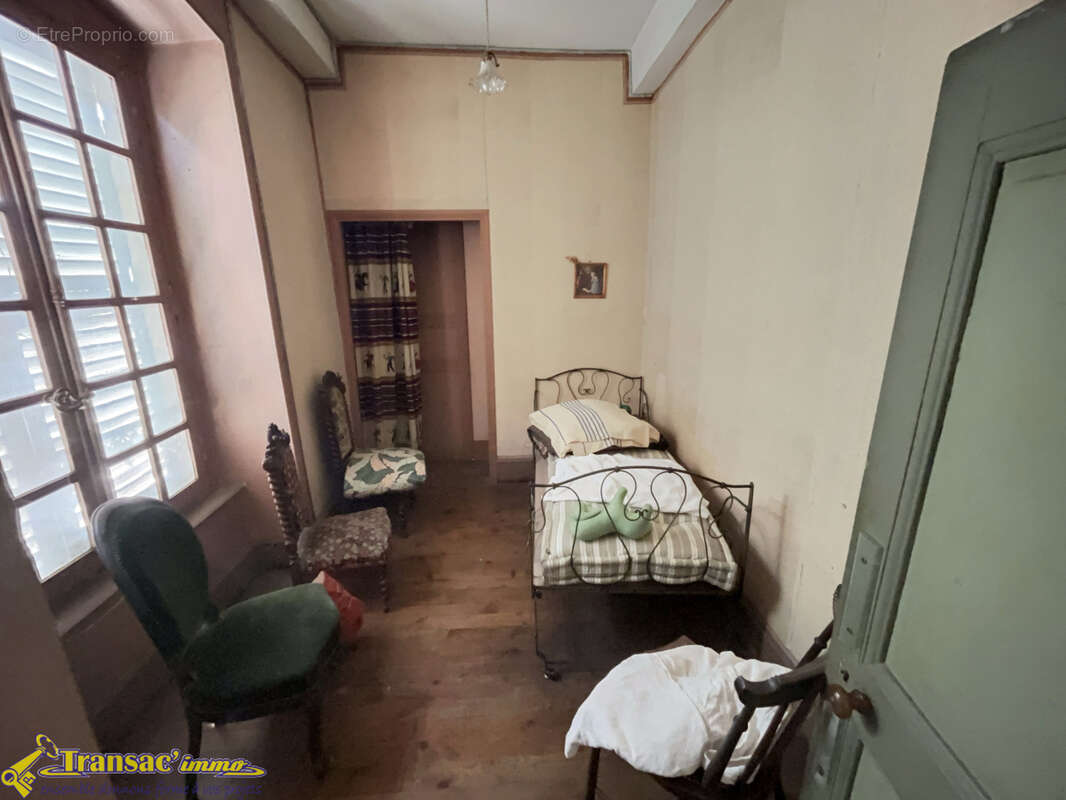 Grande maison de caractère au cœur de Courpière - photo 12