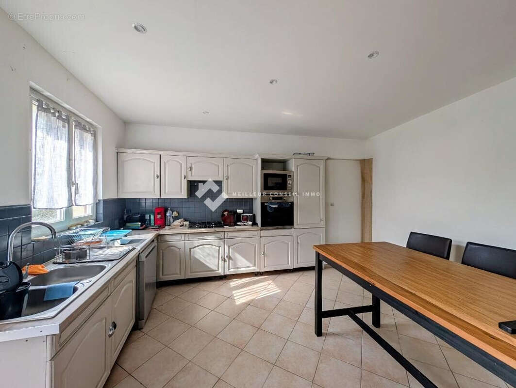 Maison 102 m² à Buxerolles  - photo 5