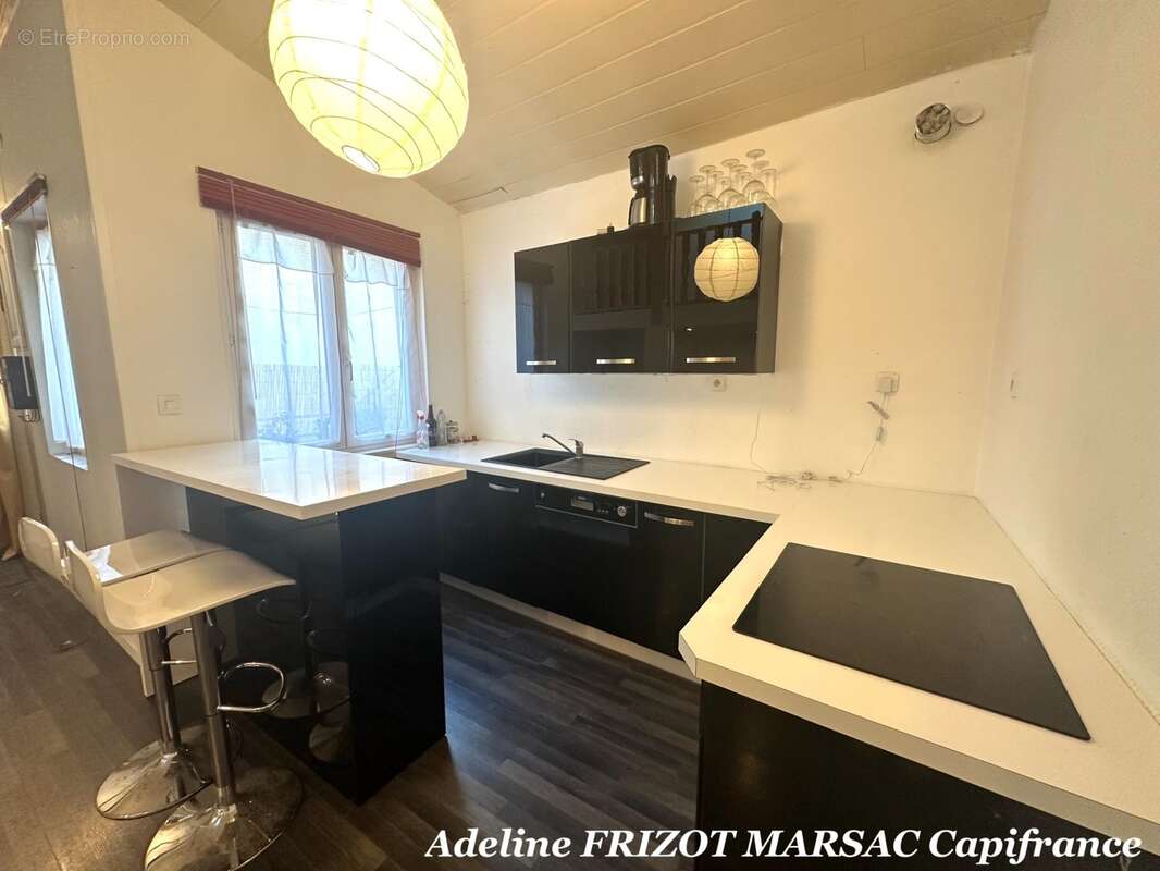 Appartement type maisonnette 54m2- terrasse - 1 chambre - mezzanine - buanderie - cave - photo 5