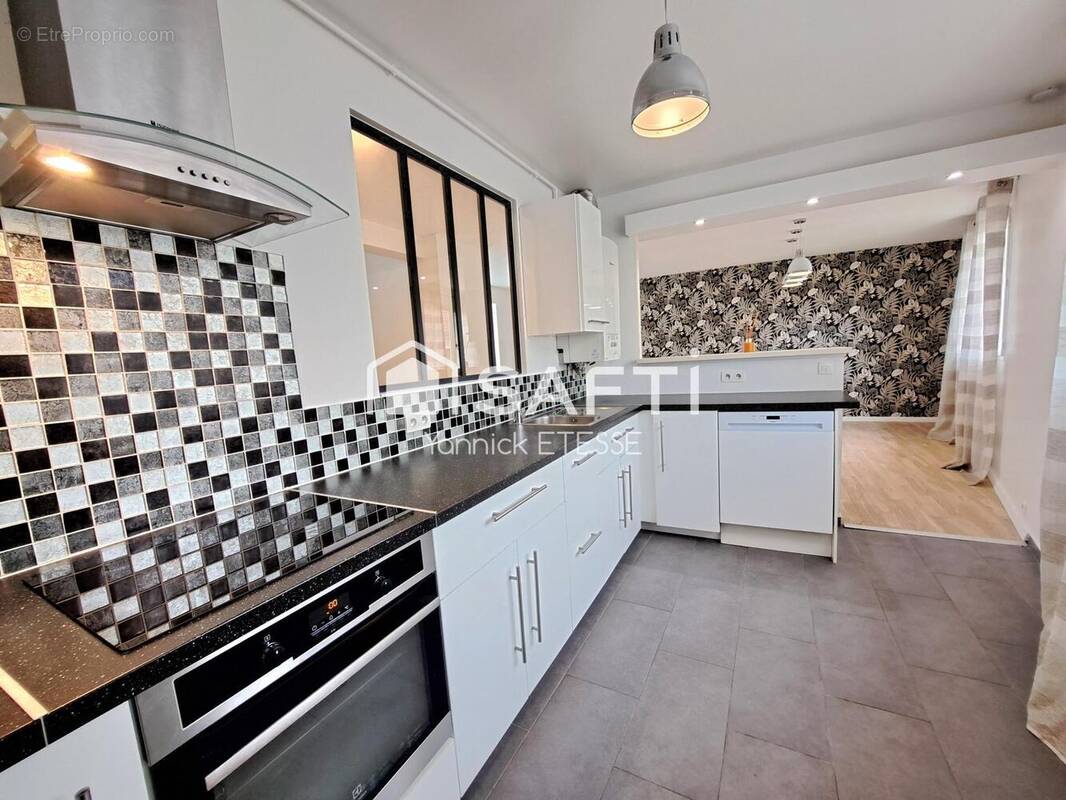 Photo 1 - Appartement à PIERRELAYE