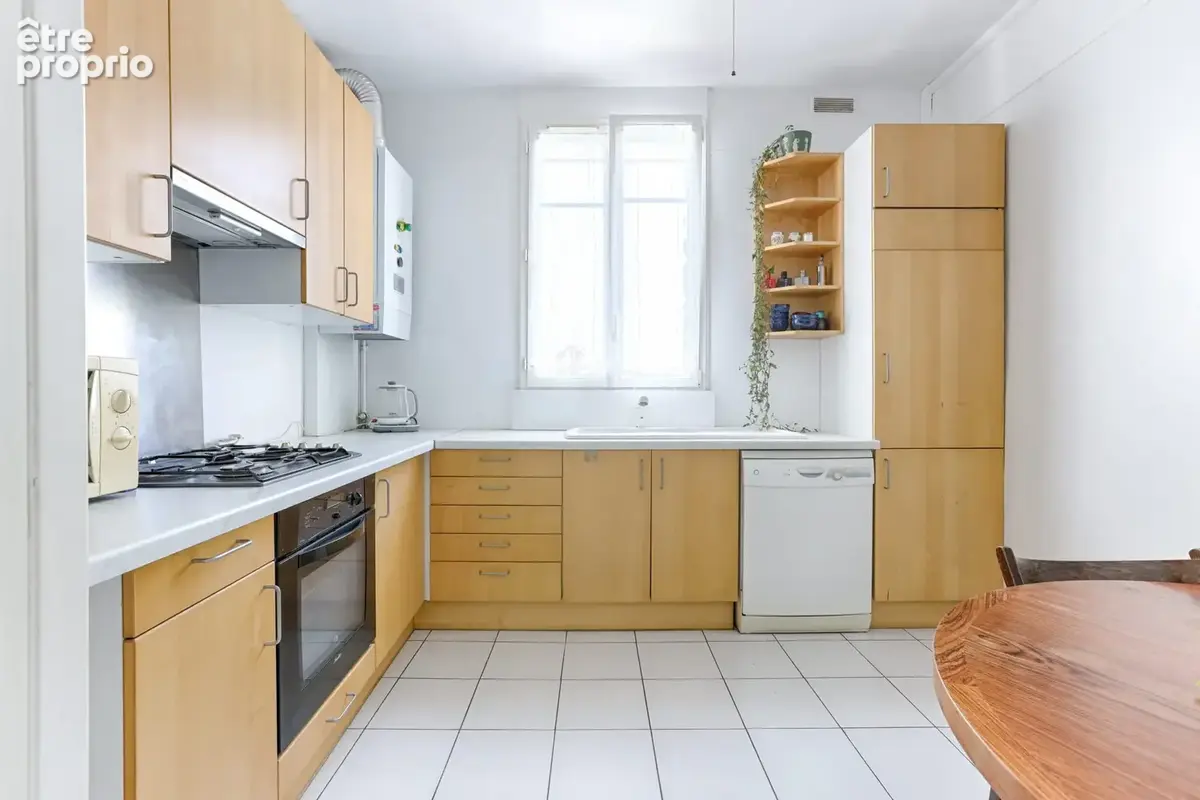 Appartement 3 pièces 62 m² à vendre à Courbevoie (92400) - photo 2