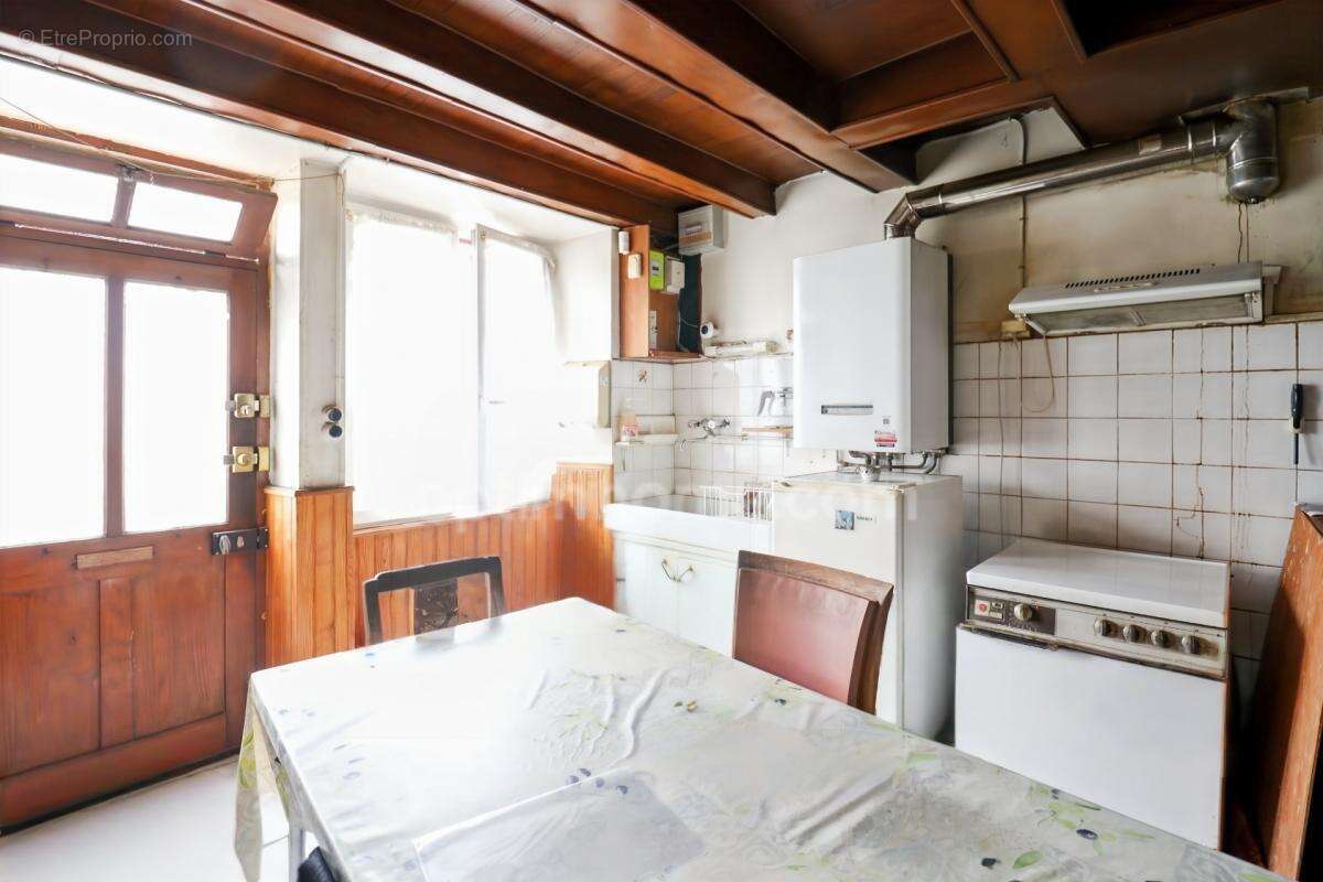 Maison de Ville sur deux niveaux - 3 pièces - 2 chambres  - Dépendance - Garage - Terrain 609 m²  - 87210 LE DORAT - photo 5