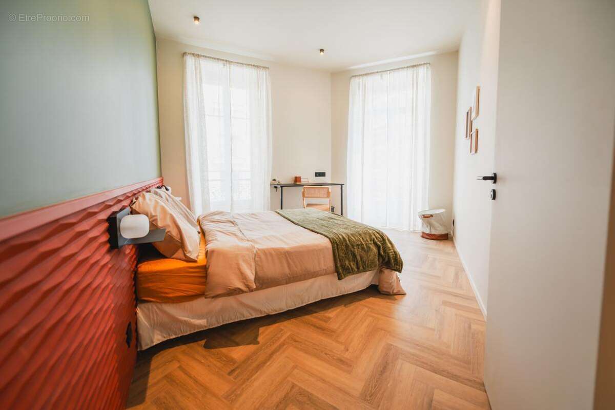 Appartement 4 pièces – 98 m² (HC) – Balcon – Aperçu mer – Vendu entièrement meublé - photo 11
