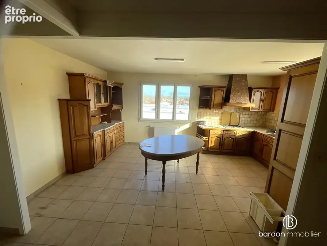 Appartement T4 - 96m² avec jardin privatif + 2 places de stationnement - photo 3