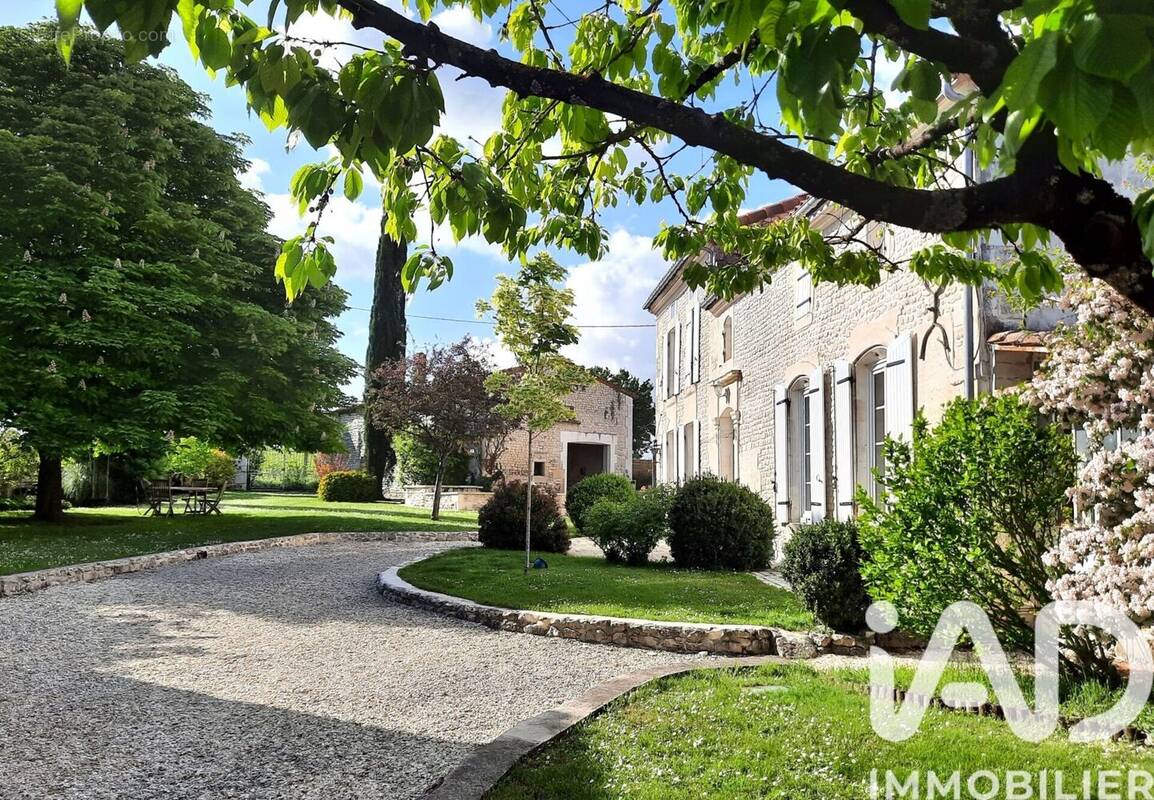 Photo 1 - Maison à ANGEAC-CHAMPAGNE