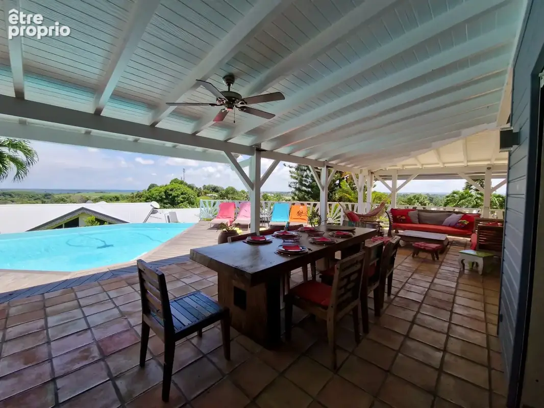 VUE MER Superbe villa de standing + T3 piscine à débordement sur 1000 m² à BAIE MAHAULT (971) - photo 5