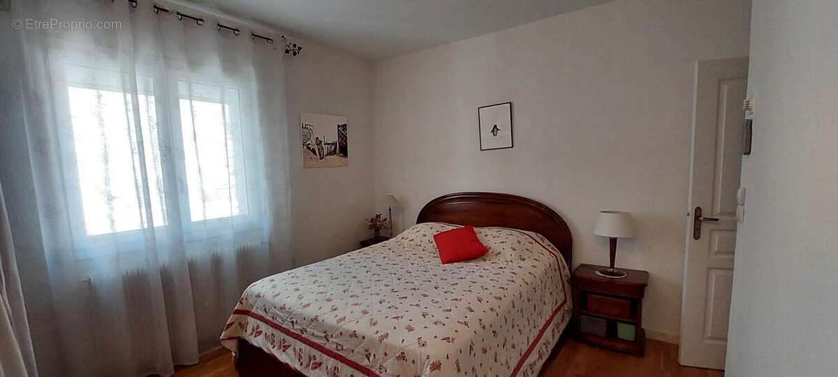 Immeuble avec 2 appartements + garage + caves - photo 9