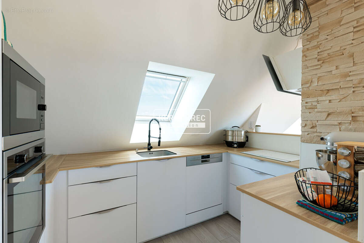 Appartement Type 4 de 84m² hab / 94m² utiles en dernier étage  - Terrasse & Garage double - photo 4