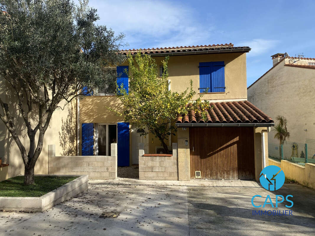 Façade côté rue - Maison à CERET
