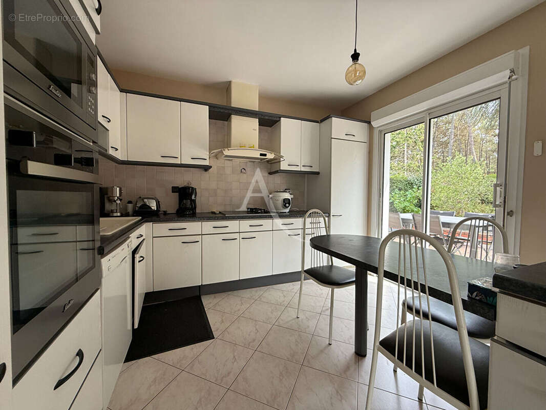 Maison 115m², 3 chambres, sous-sol et double garage - photo 4