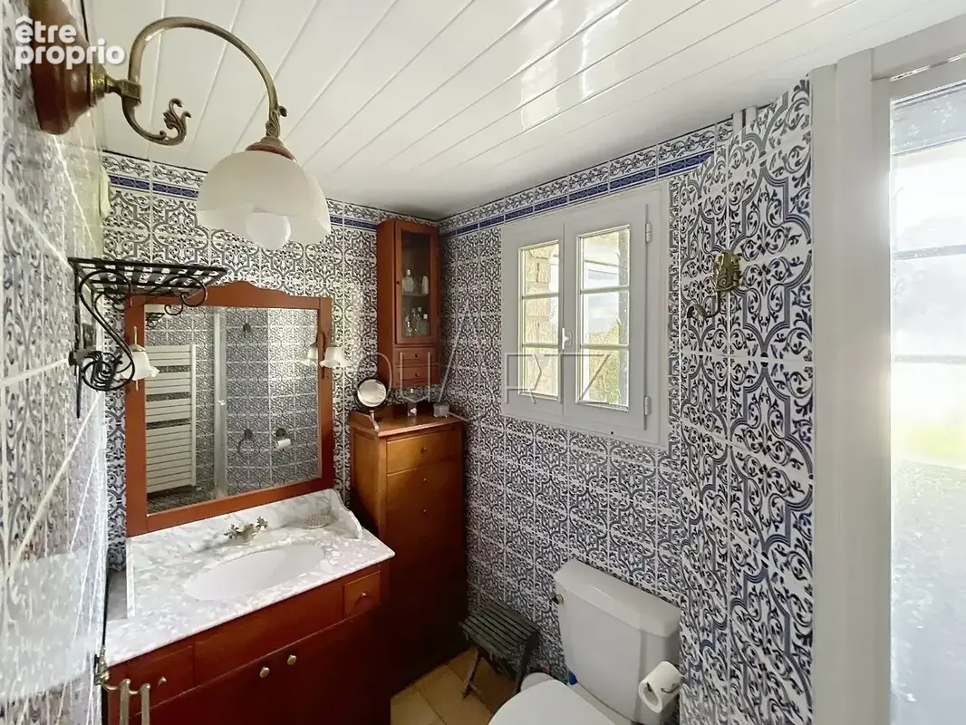 Propriété composée de deux maisons et ses annexes - photo 14