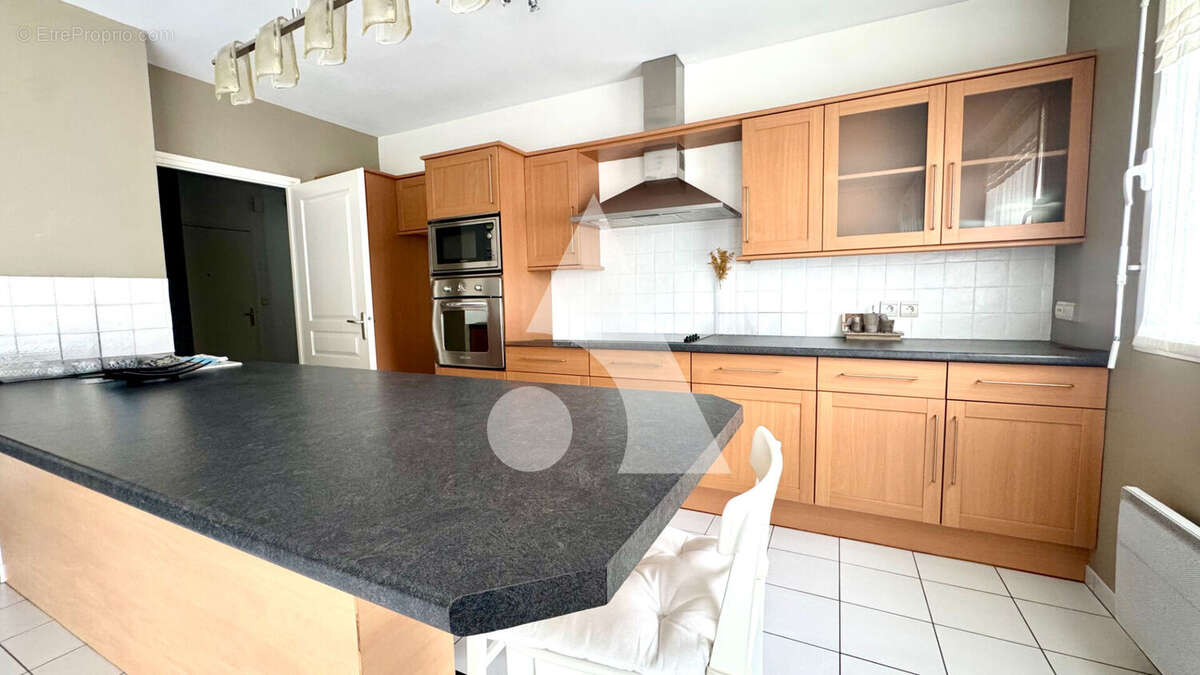 Appartement T3 en rez-de-chaussée avec terrasse et 2 places de parking ? Brebières - photo 2