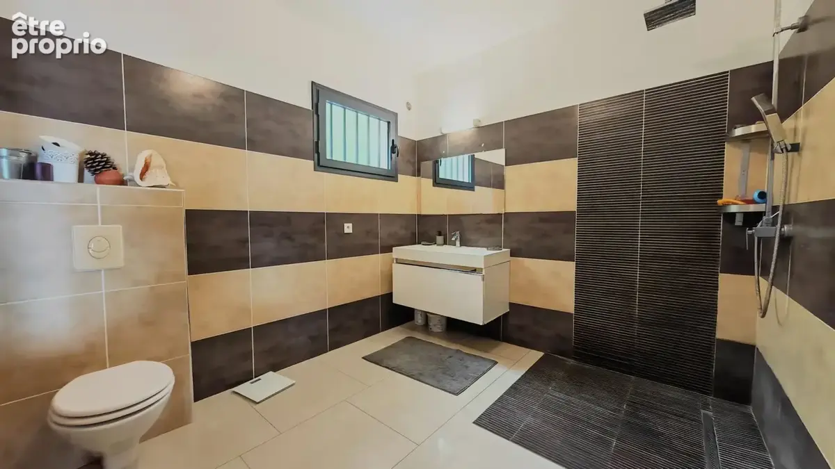 Maison 5 pièces 148 m² à vendre à Saint-Pierre (97410) - photo 9