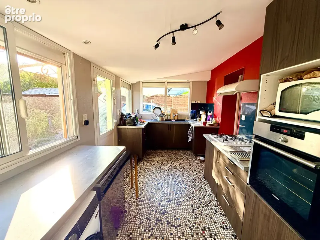 Maison en pierre en plein centre ville - photo 6