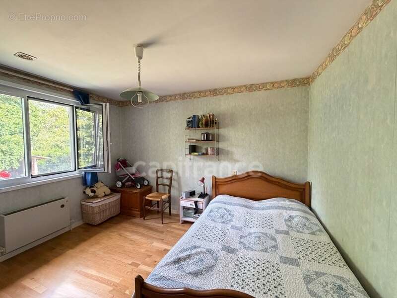Maison familiale avec grand sous-sol, jardin arboré et vue dégagée – Proche Pont-de-Vaux - photo 16