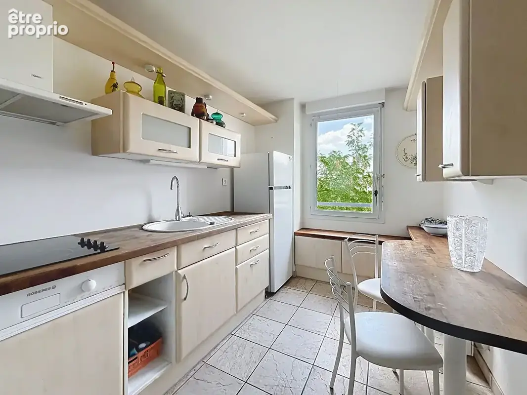 Appartement T3/4 de 93 M² avec balcon et parking - photo 4