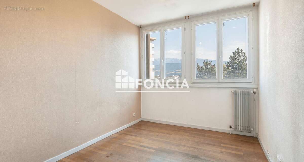 MEYLAN, Secteur Ayguinards, T3 de 56 m2 au 4ème étage avec balcon - photo 8