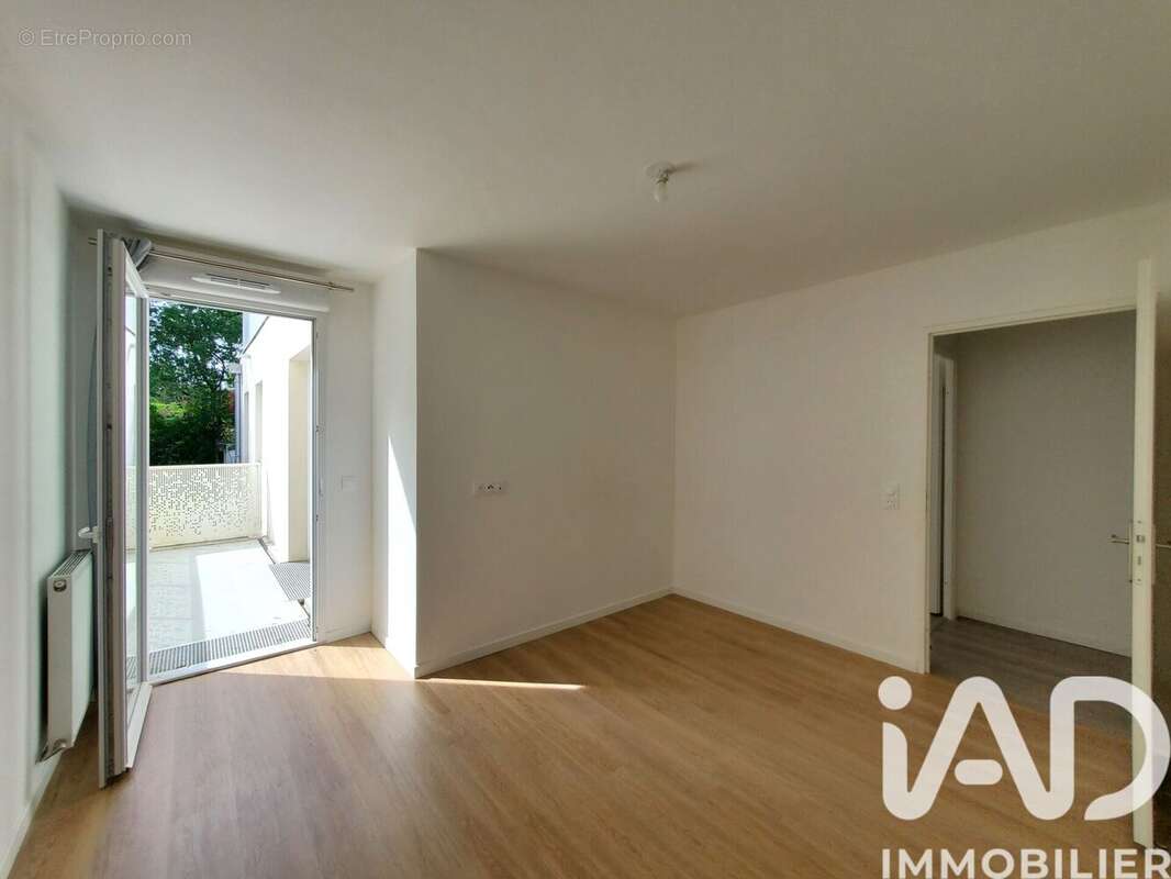 Photo 7 - Appartement à VOISINS-LE-BRETONNEUX