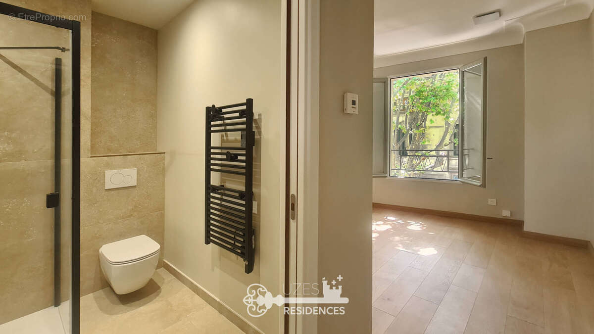 Appartement rénové de 90 m2 avec terrasse et 2 suites au cœur d'Uzès - photo 10